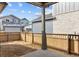 Backyard with a privacy fence and new construction at 21204 E 63Rd Dr, Aurora, CO 80019