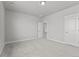 Spacious carpeted bedroom with ensuite bathroom and great natural light at 21204 E 63Rd Dr, Aurora, CO 80019