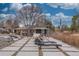 Backyard with a cozy seating area and modern patio pavers at 597 Vista Dr, Castle Rock, CO 80104