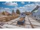 Backyard with a fire pit and modern patio pavers at 597 Vista Dr, Castle Rock, CO 80104