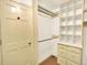 Well-organized closet with shelving and drawers for efficient storage at 12135 W Applewood Knolls Dr, Lakewood, CO 80215
