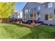 Deck and grassy backyard with string lights at 5630 Spruce Ave, Castle Rock, CO 80104