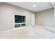 Finished basement with built-in entertainment center and carpet at 5630 Spruce Ave, Castle Rock, CO 80104