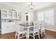 Dining room features hardwood floors and white built-in hutch at 5630 Spruce Ave, Castle Rock, CO 80104