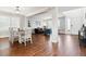 Bright dining room with hardwood floors, white table, and chairs at 5630 Spruce Ave, Castle Rock, CO 80104