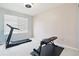 Home gym with treadmill and weight bench at 5630 Spruce Ave, Castle Rock, CO 80104