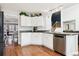 Bright kitchen, ample counter space, and stainless steel dishwasher at 5630 Spruce Ave, Castle Rock, CO 80104