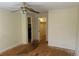 Bedroom features a ceiling fan and an open closet at 14602 E 2Nd Ave # 108-C, Aurora, CO 80011