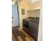 A laundry room with modern washer and dryer at 14602 E 2Nd Ave # 108-C, Aurora, CO 80011