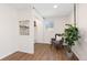 Bright sitting area featuring a leafy houseplant and natural light from the window at 1755 Quince St, Denver, CO 80220
