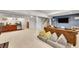Finished basement with TV, kitchenette and sitting area at 4012 S Newport Way, Denver, CO 80237