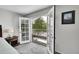 Serene bedroom with french doors to a balcony and mountain view art at 4012 S Newport Way, Denver, CO 80237