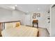 Inviting bedroom featuring neutral walls, wood floors, and natural light at 4012 S Newport Way, Denver, CO 80237