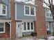 Townhouse exterior featuring brick and gray siding at 4211 E 94Th Ave # C, Thornton, CO 80229