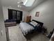 Main bedroom with a plush bed and sitting area at 4211 E 94Th Ave # C, Thornton, CO 80229