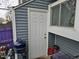 Exterior storage shed with a door and window; next to the patio at 4211 E 94Th Ave # C, Thornton, CO 80229