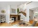 Comfortable living room featuring a fireplace and vaulted ceiling at 9400 E Iliff Ave # 292, Denver, CO 80231