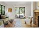 Bright living room with patio doors overlooking the pool and backyard at 9400 E Iliff Ave # 292, Denver, CO 80231