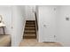 Carpeted staircase leading to the upper level of the home at 9400 E Iliff Ave # 292, Denver, CO 80231