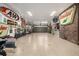 Spacious garage with car decor, organized with wall decorations and ample storage at 6740 S Windermere St, Littleton, CO 80120