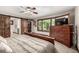 Comfortable main bedroom with generous space, wooden furniture, and closet with sliding barn doors at 6740 S Windermere St, Littleton, CO 80120