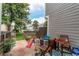 Fenced backyard with patio area, landscaping, and playful slide at 19807 Victorian Way, Parker, CO 80138