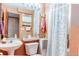 Bathroom with a white vanity, sink, a toilet and a shower at 19807 Victorian Way, Parker, CO 80138