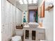 Bathroom featuring a white sink vanity and floral shower curtain at 19807 Victorian Way, Parker, CO 80138