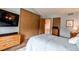 Inviting bedroom with a wooden dresser, tv, and serene ambiance at 19807 Victorian Way, Parker, CO 80138