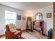 Bedroom with hardwood floors, natural light, and stylish decor at 19807 Victorian Way, Parker, CO 80138