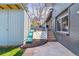 Unique backyard features include a slide and climbing wall and shaded seating area at 3722 S Quebec St, Denver, CO 80237