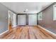 Bedroom with two large closets and wood look laminate flooring at 3722 S Quebec St, Denver, CO 80237