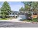 Charming home featuring a well-maintained yard and an attached two-car garage at 3722 S Quebec St, Denver, CO 80237