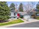 A well-maintained single-Gathering home with a front lawn, mature trees and an attached garage at 3722 S Quebec St, Denver, CO 80237