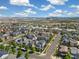 Aerial view of the neighborhood showcasing the city skyline at 1882 W 67Th Ave, Denver, CO 80221