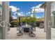 Backyard patio with a firepit and chairs offers a relaxing outdoor space at 1882 W 67Th Ave, Denver, CO 80221