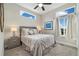 This bedroom has neutral tones, natural lighting and an overhead fan at 1882 W 67Th Ave, Denver, CO 80221