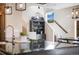Partial view of a dining space, staircase, and bar at 1882 W 67Th Ave, Denver, CO 80221