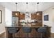 Beautiful kitchen featuring granite countertops, modern lighting, and stainless steel appliances at 1882 W 67Th Ave, Denver, CO 80221