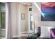 Bright living room featuring dark hardwood floors, comfortable seating, and natural light at 1882 W 67Th Ave, Denver, CO 80221