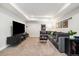 Spacious living room has recessed lighting and a large sectional sofa at 1882 W 67Th Ave, Denver, CO 80221
