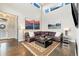 Elegant living room with high ceilings, dark hardwood floors, and stylish, comfortable seating at 1882 W 67Th Ave, Denver, CO 80221