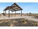 Outdoor picnic area with covered shelter, surrounded by open space and neighborhood views at 1882 W 67Th Ave, Denver, CO 80221