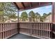 Cozy balcony offers a quiet outdoor space with tree-lined views, perfect for relaxing and enjoying the scenery at 9725 E Harvard Ave # 323, Denver, CO 80231