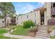 Well-maintained condo complex features multiple units, outdoor staircases, and landscaped grounds for relaxed community living at 9725 E Harvard Ave # 323, Denver, CO 80231