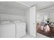 Laundry room featuring washer and dryer at 9725 E Harvard Ave # 323, Denver, CO 80231