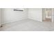 Comfortable bedroom with soft carpet and an open doorway to the hallway at 7376 Watercress Dr, Littleton, CO 80125