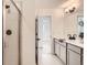 Modern bathroom with a tiled shower, sleek vanity, and contemporary fixtures for a clean look at 374 N Geneva St, Aurora, CO 80010