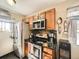 Efficient kitchen with stainless steel appliances and modern countertops at 7870 Kimberly St, Commerce City, CO 80022