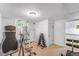 Well-equipped home gym with modern exercise machines, weight rack and large mirror, perfect for fitness enthusiasts at 6023 E 6Th Avenue Pkwy, Denver, CO 80220